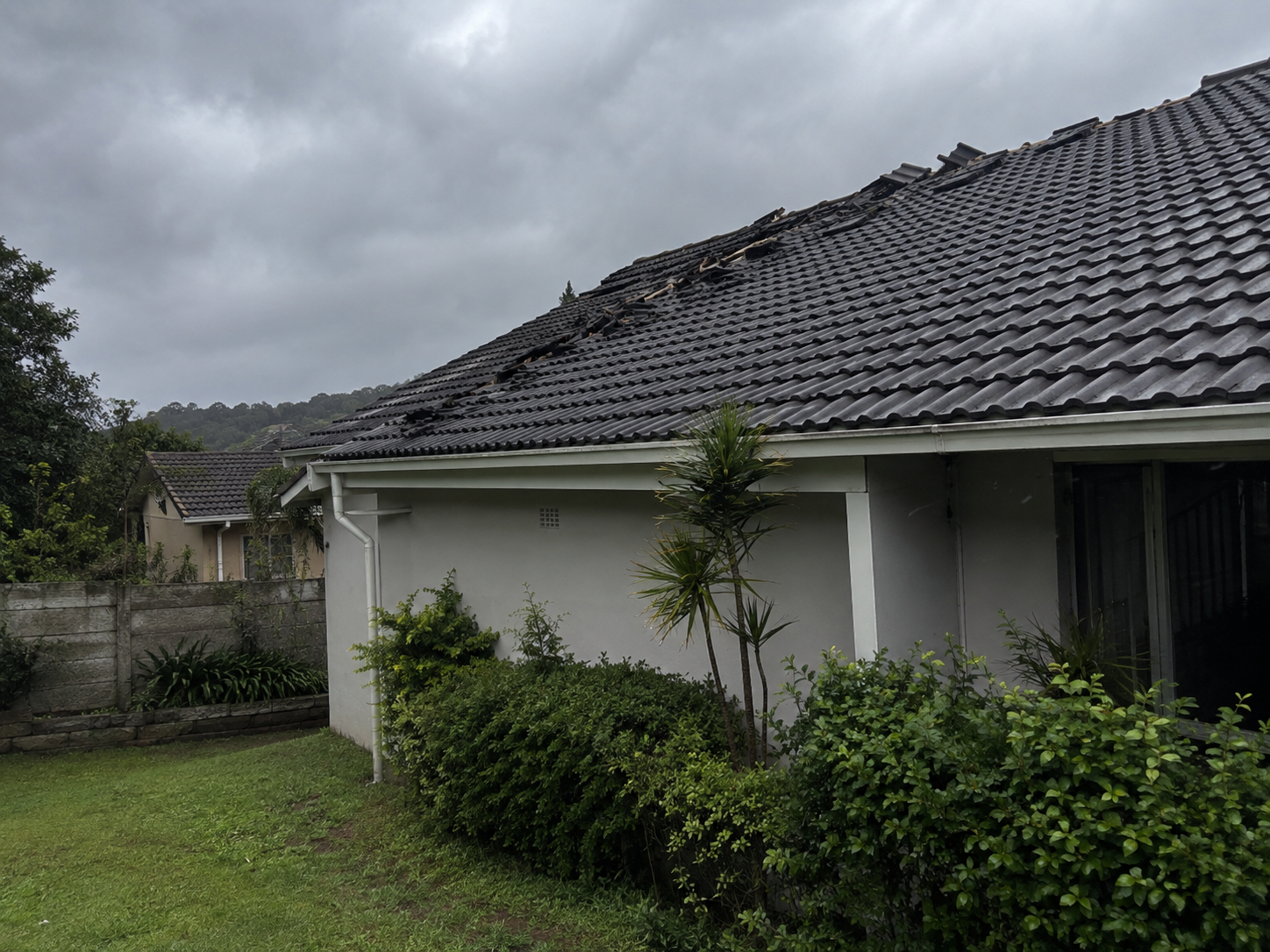 Storm-damaged roof pitch